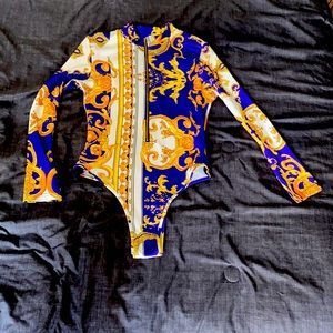 Purple and gold bodysuit- clubbing